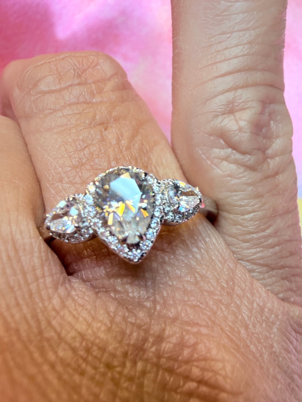 New Pear-Shaped Moissanite Ring with Halo accent side stones and Pave' shine